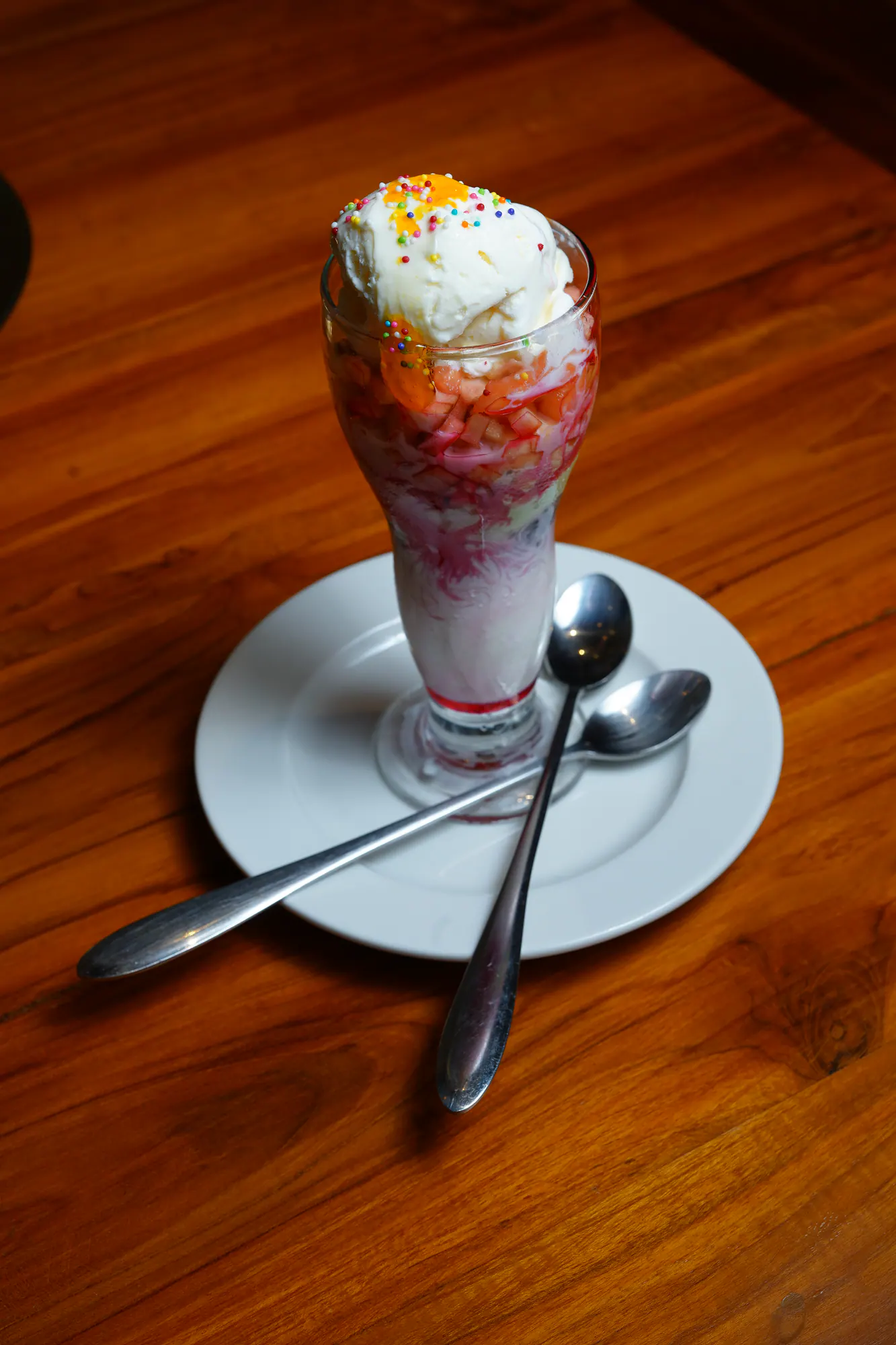 A tall chilled falooda finished with ice cream